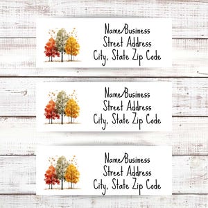 May include: White rectangular address labels with a watercolor image of autumn trees in shades of red, yellow, and green. The labels include the text "Name Business", "Street Address", and "City, State Zip Code".
