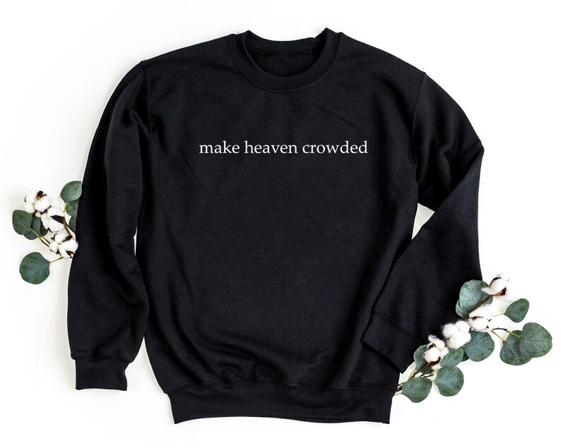 May include: Black sweatshirt with the text "make heaven crowded" printed in white on the front.