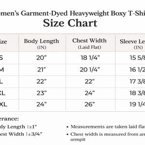 The image is a size chart for women's garment-dyeed heavyweight boxy t-shirt. It provides measurements for different body lengths and chest widths, along with corresponding sleeve lengths. The chart is designed to help customers determine the appropriate size based on their body measurements.