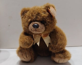 This vintage 1998 Ty Magee The Brown Bear Stuffed Plush Animal collectors