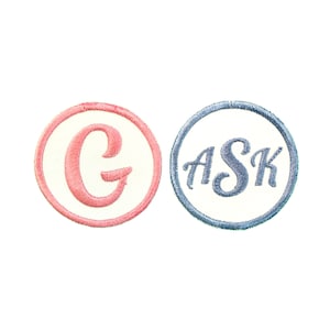 May include: Two embroidered patches, one pink with a white circle and the letter "G" inside, the other blue with a white circle and the word "ASK" inside.