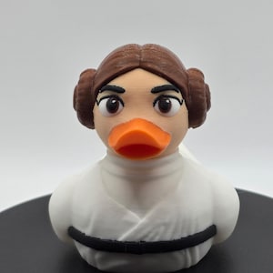 Rebel Leader-Inspired Jeep Duck | White Robes, Hair Buns & Black Belt | 3D Printed Collectible for Jeep Ducking or Display