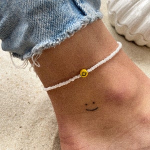 Anklet with smiley face