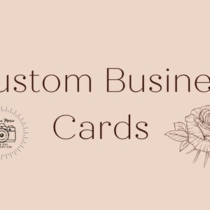 May include: Custom Business Cards text on a pale pink background. The text is in a dark brown colour. A camera logo and a rose illustration are on the left and right sides of the text.