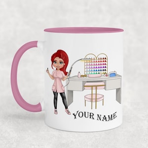 May include: White ceramic mug with a pink rim and handle. The mug features a cartoon illustration of a woman with red hair giving a manicure. The illustration includes a nail polish rack, a table, and a chair. The text "YOUR NAME" is printed on the mug.