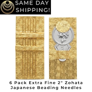 May include: A 6-pack of extra fine 2-inch Zohata Japanese beading needles. The needles are housed in a rectangular gold-colored case with a textured, swirling pattern. One side shows the needles, while the other features a silver coin-like emblem.