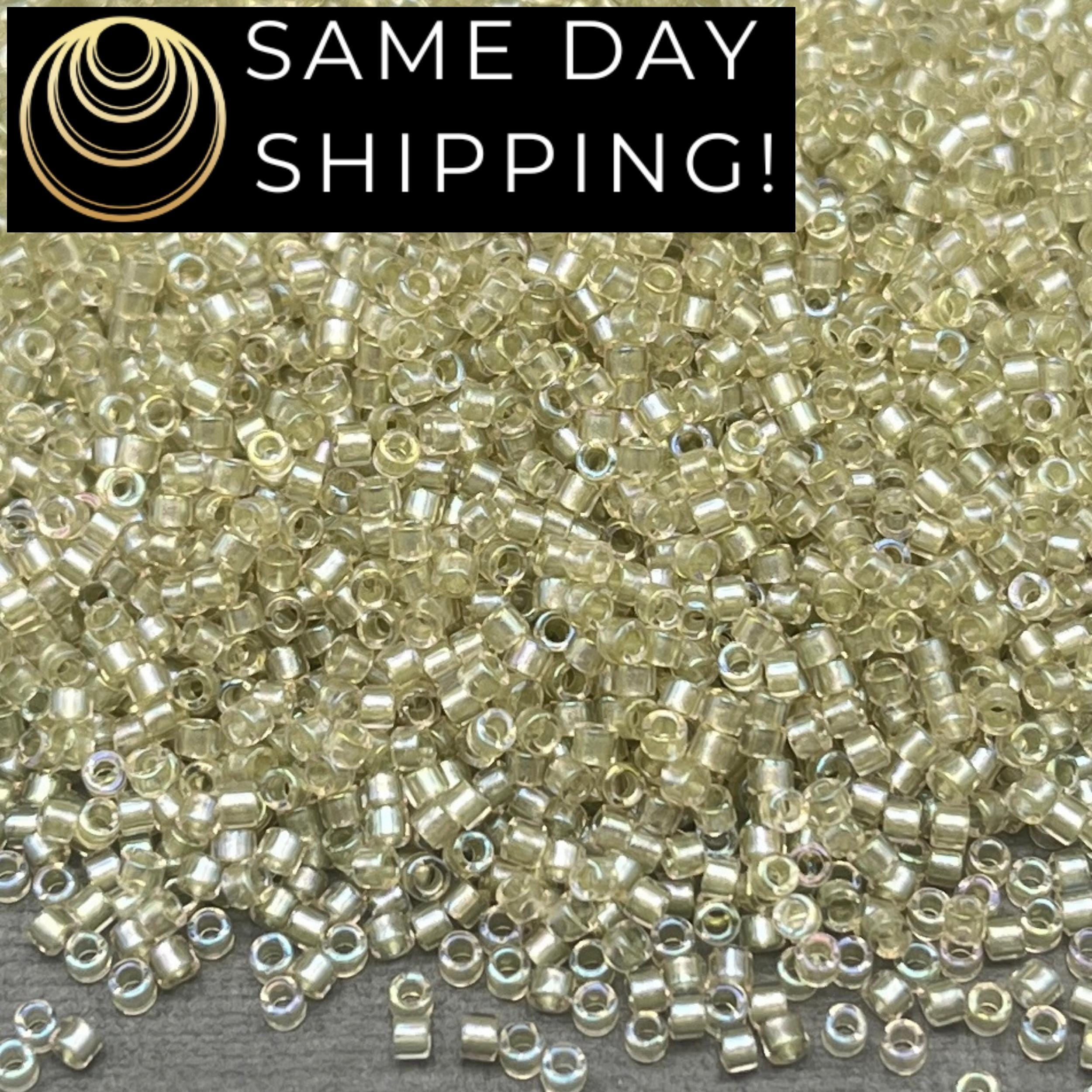 DB1766 11/0 Miyuki Delica Beads Sparkling Celery Lined Light Tea
