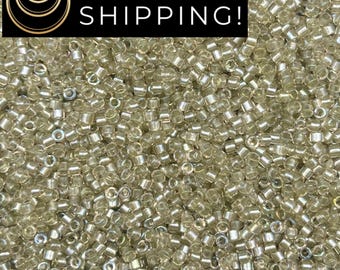 DB1766 11/0 Miyuki Delica Beads Sparkling Celery Lined Light Tea