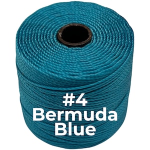 May include: A cylindrical spool of tightly wound Bermuda Blue cord featuring a dark brown center core. The spool is clearly labeled with the white text #4 Bermuda Blue printed directly onto the front of the vibrant turquoise colored cord.