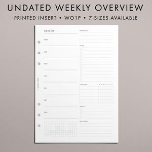 May include: A white undated weekly planner insert with the text "UNDATED WEEKLY OVERVIEW" and "PRINTED INSERT". The planner has sections for each day of the week, priorities, to-do lists, trackers, goals, and next week.
