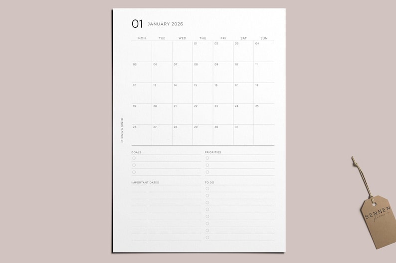 May include: A minimalist white 2026 January calendar with a grid layout, featuring days of the week across the top and space for goals, priorities, important dates, and to-do lists. The top left corner displays "01 January 2026".