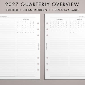 May include: Two white planner pages for 2027 quarterly overview with black text. The left page shows January with goals and to-do lists. The right page shows February and March calendars with lined sections. Both pages feature punched holes for binding.