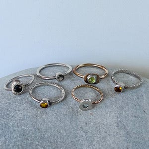 Gemstone stacker rings sold individually.