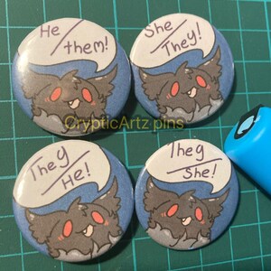 mothman pronoun pins!
