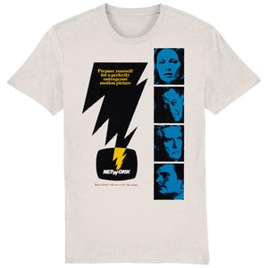 May include: A white t-shirt with a black and yellow lightning bolt graphic and a blue and white television screen with the word "NETWORK" printed on it. The shirt also features four black and white portraits of people. The text "Prepare yourself for a perfectly outrageous motion picture" is printed on the shirt.