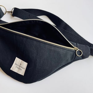 Black cotton twill fanny pack, adjustable strap, shoulder strap