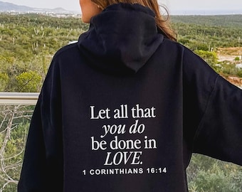 May include: Black hooded sweatshirt with the text "Let all that you do be done in LOVE. 1 Corinthians 16:14" printed on the back.