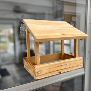 Fly thru window bird feeder