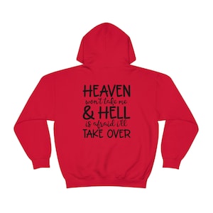 Heaven Won&#39;t Take Me & Hell Is Afraid I&#39;ll Take Over on the back of a Unisex Heavy Blend Hooded Sweatshirt