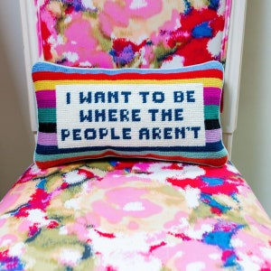 I wanna be where the people aren’t modern striped rainbow, pinks needlepoint pillow Furbish. Wool throw pillow