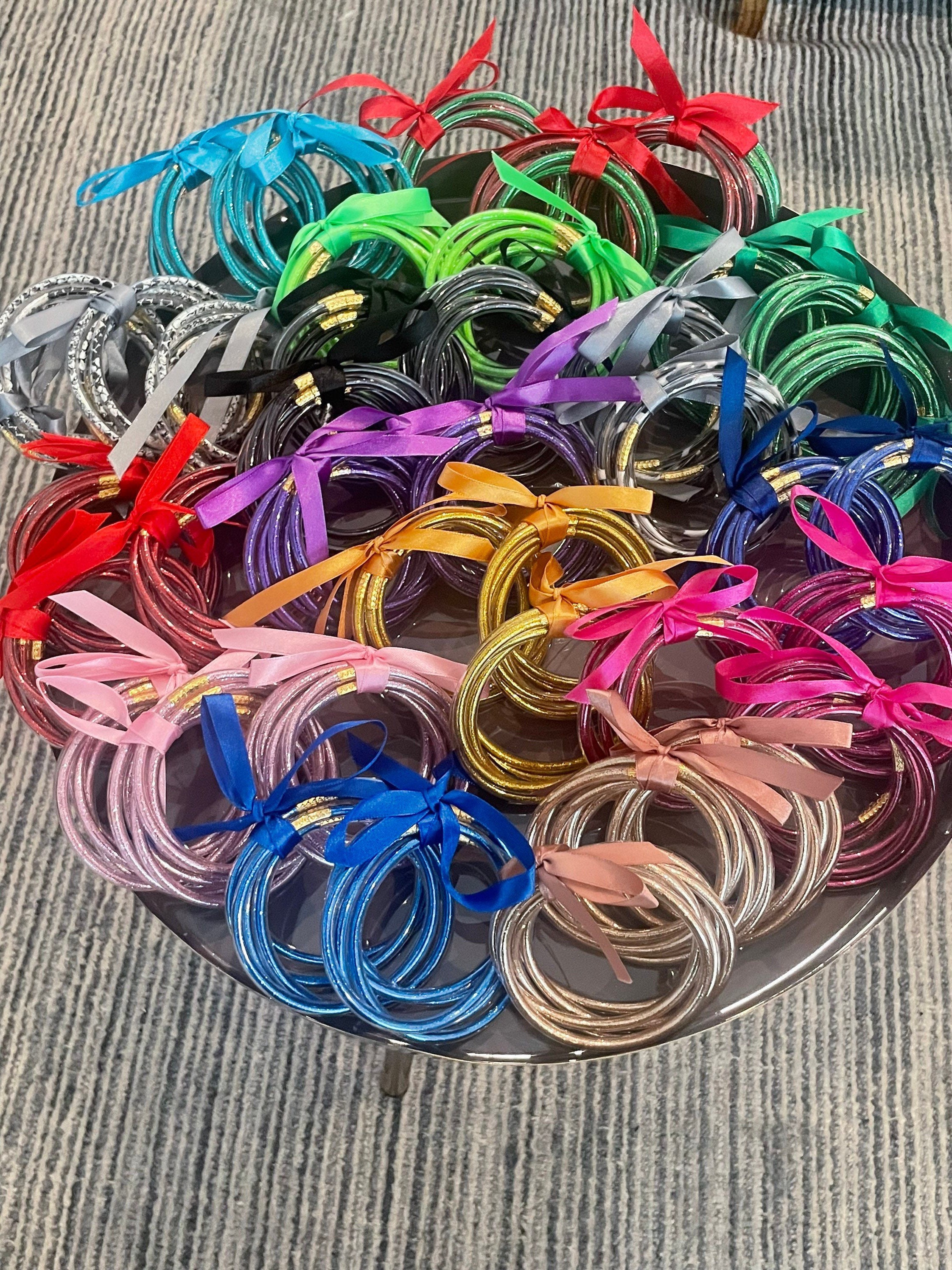 Amazon.com: 200 Pcs Jelly Bracelets 80's Glow Silicone Jelly Bracelets  Girls Women Hair Ties Retro Neon Rainbow Silicone Wristband, Halloween  Christmas Disco Party for Adults and Children : Toys & Games