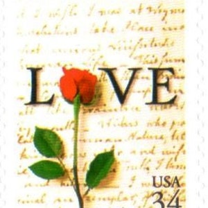 May include: A vintage-style stamp with a red rose and the word "LOVE" printed in black. The stamp is on a background of handwritten text and has a "USA 34" denomination.
