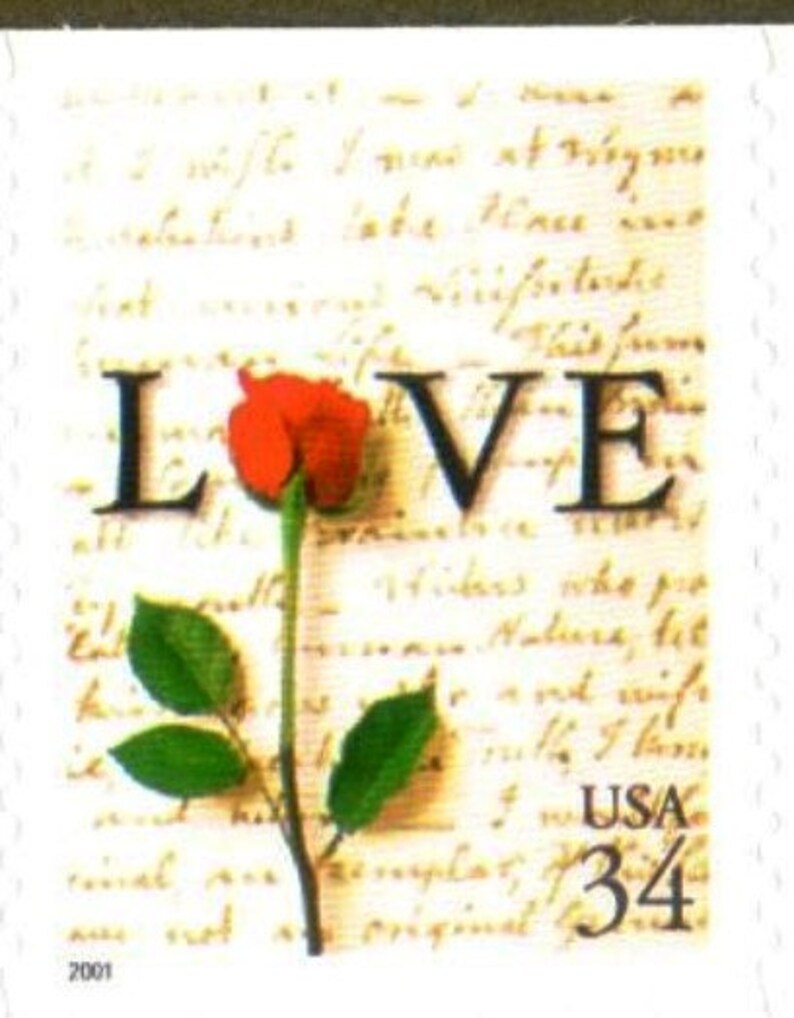 May include: A vintage-style stamp with a red rose and the word "LOVE" printed in black. The stamp is on a background of handwritten text and has a "USA 34" denomination.