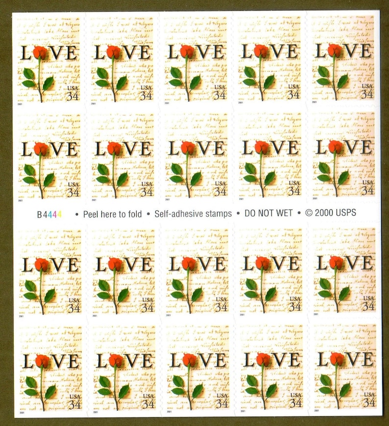 May include: A sheet of twenty 34-cent US postage stamps featuring a red rose with the word "LOVE" printed on each stamp. The stamps are self-adhesive and have the text "DO NOT WET" printed at the bottom.