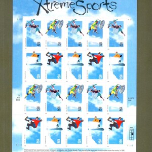 May include: Sheet of "Xtreme Sports" postage stamps featuring athletes performing various sports against a blue sky background. Each stamp has "USA 33" printed on it. The sheet includes the text "Xtreme Sports" and "USPS 1998".
