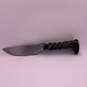 Hand forged railroad spike knife with a twist handle