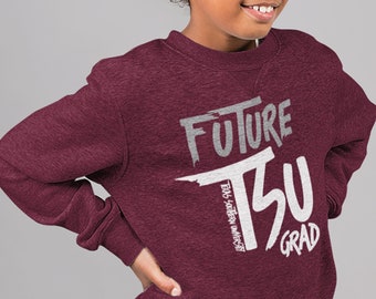 May include: A maroon sweatshirt with the text "FUTURE" and "TSU GRAD" in white. The text "TEXAS SOUTHERN UNIVERSITY" is written in smaller white text below "TSU".