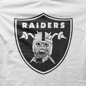 Camiseta de ciencia ficción parodia del escudo de los Tusken Raiders M5586