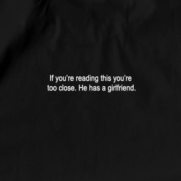 If you're reading this you're too close. He has a girlfriend -  Funny T-Shirt