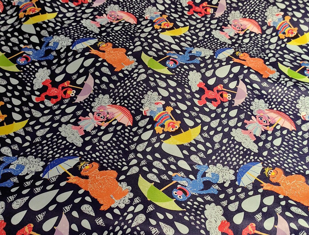 Sesame Street Softshell Fabric Dark Blue Umbrellas