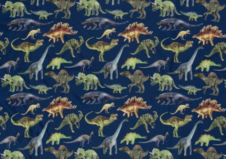 May include: A blue fabric with a repeating pattern of colorful dinosaurs. The dinosaurs are in various poses and include a stegosaurus, triceratops, brachiosaurus, and others.