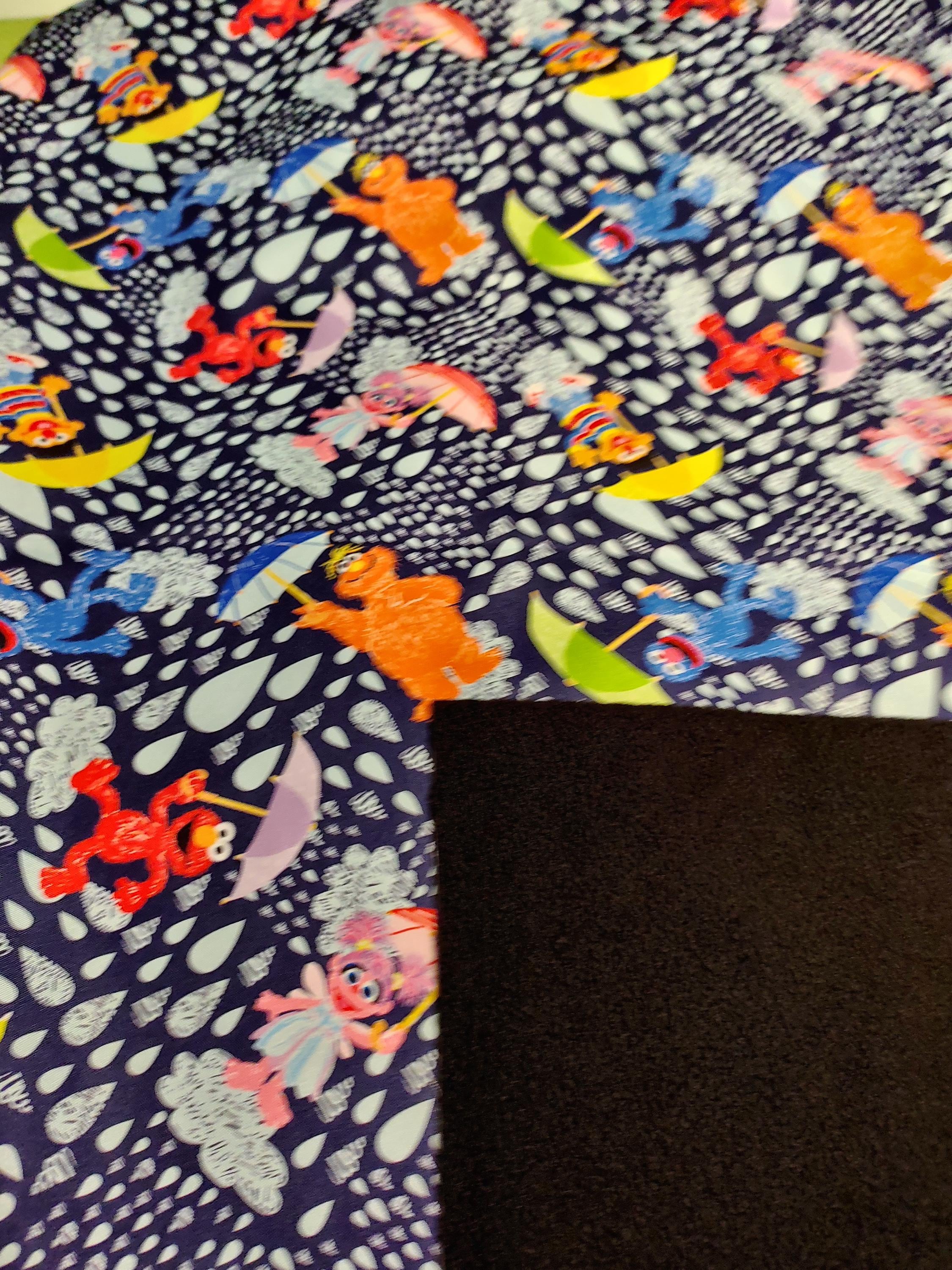 Sesame Street Softshell Fabric Dark Blue Umbrellas