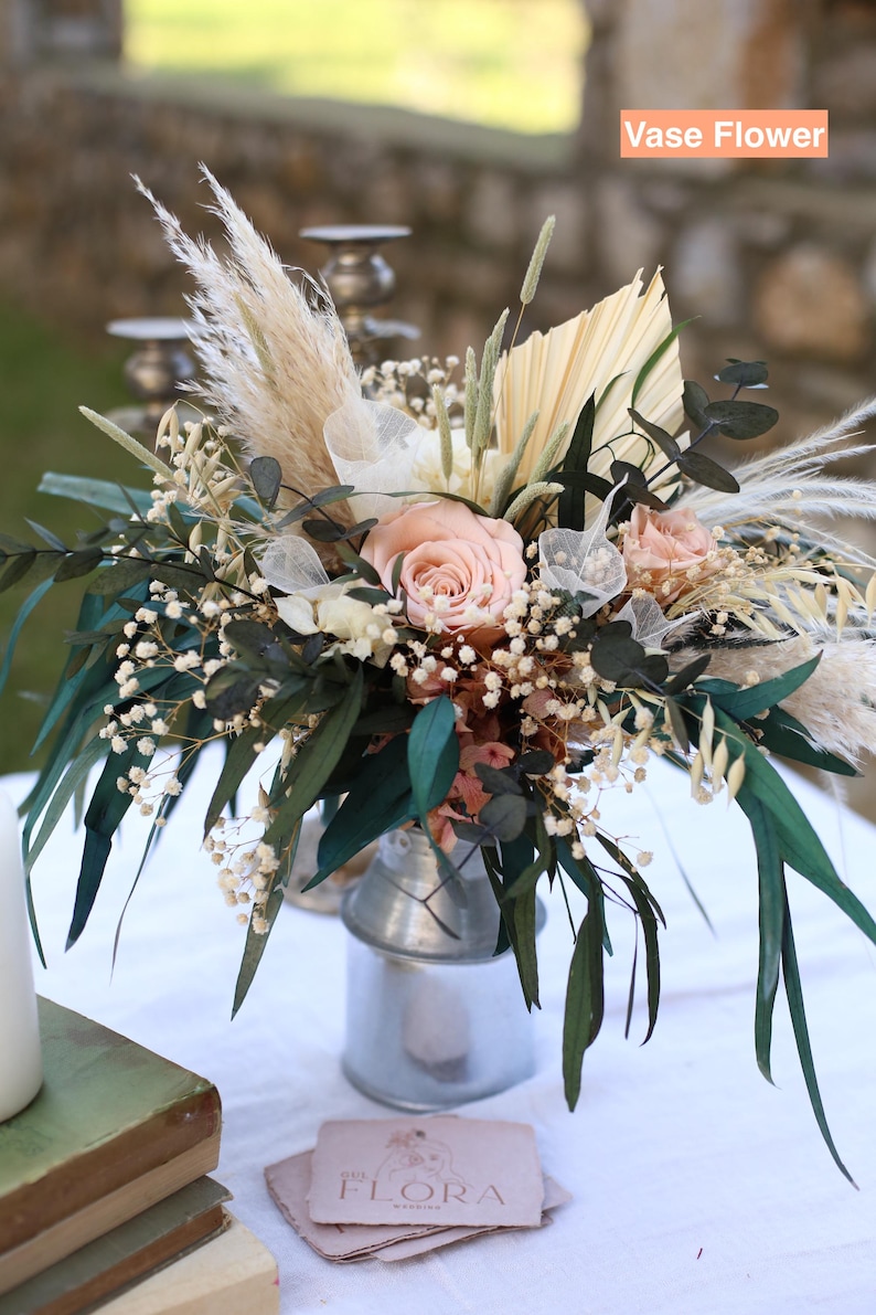 Vase flower arrangement with preserved blush roses, pampas grass, eucalyptus, and dried greenery. Rustic boho wedding table decor handmade by GulFloraWedding, perfect for centerpieces or gifts.