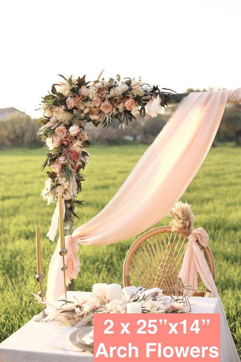 Wedding arch floral arrangement handmade with preserved salmon roses, pampas grass and eucalyptus. Two 25”x14” arch flowers by GulFloraWedding, perfect for boho rustic outdoor wedding ceremony decor and photography styling.
