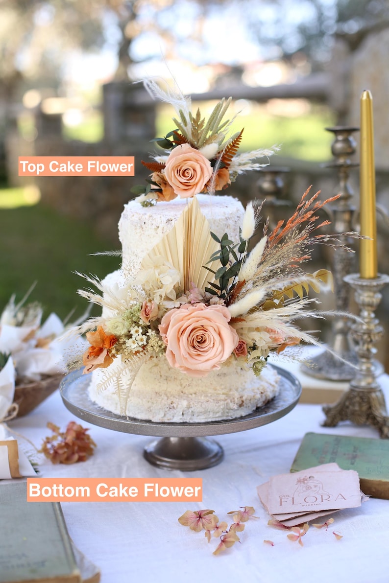 Wedding cake flower set featuring preserved blush roses, pampas grass, dried greenery and palm leaves. Includes top and bottom floral arrangements. Boho rustic handmade decor by GulFloraWedding.