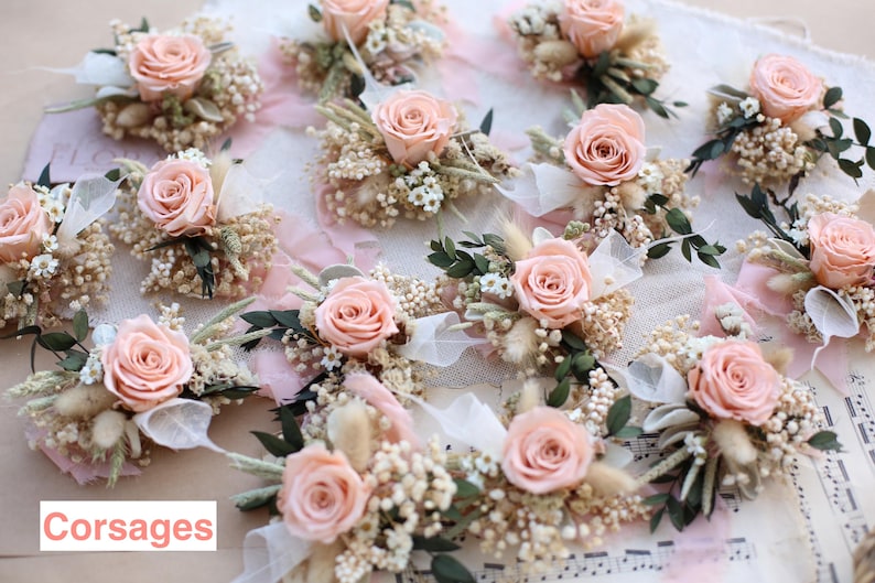 Collection of dried and preserved flower corsages with preserved salmon roses, gypsophila and eucalyptus — handmade by GulFloraWedding to match bridal bouquets and boutonnieres. Elegant accessories for bridesmaids, mothers and wedding guests.