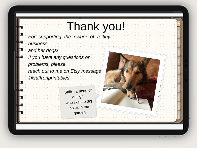 May include: A handwritten thank you note with a picture of a dog in a brown and red chair. The note says "Thank you! For supporting the owner of a tiny business and her dogs! If you have any questions or problems, please reach out to me on Etsy message @saffronprintables". The note also says "Saffron, head of design, who likes to dig holes in the garden".