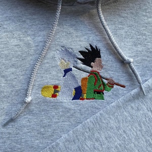 Rod and Skateboard Art Embroidered Crewneck and Hoodie