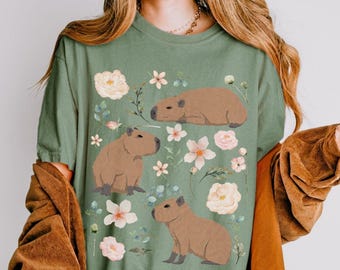 Maglietta Capybara Comfort Colors Cottagecore, regalo per gli amanti degli animali, estetica Goblincore, maglietta botanica floreale con tema zoologico e fauna selvatica, vestiti alternativi
