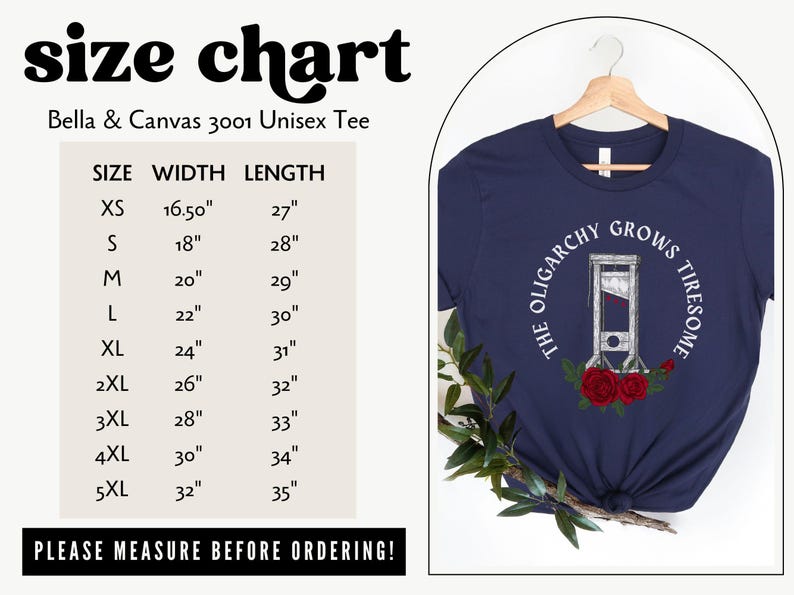 May include: Navy blue unisex t-shirt with the text "THE OLIGARCHY GROWS TIRESOME" and a guillotine graphic. A size chart is included, with measurements in inches. The shirt is hanging on a wooden hanger.