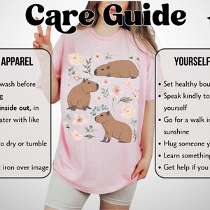 Maglietta Capybara Comfort Colors Cottagecore, regalo per gli amanti degli animali, estetica Goblincore, maglietta botanica floreale con tema zoologico e fauna selvatica, vestiti alternativi Blossom