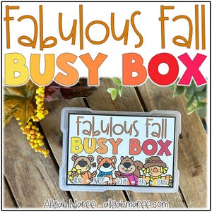 May include: A clear plastic storage container featuring a label that reads Fabulous Fall BUSY BOX with illustrations of a bear, fox, squirrel, and scarecrow. The label includes the words READ, WRITE, SOLVE, PLAY, and LEARN below the characters.
