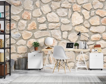 May include: A home office setup featuring a light wood desk with a laptop displaying "4:43". A white chair with wooden legs sits in front of the desk. The background is a stone wall. There are white cabinets, a black bookshelf, and a globe.