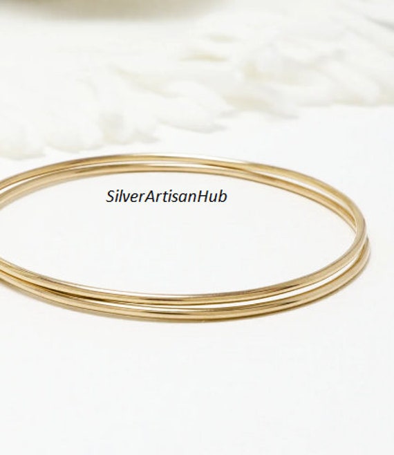 Slim gold bangles best sale