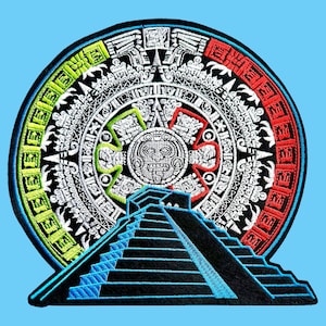 May include: A circular embroidered patch featuring a detailed Aztec sun stone calendar design in white, with a vibrant green left border and a bright red right border. Below the calendar sits a black stepped pyramid with blue embroidered outlines.