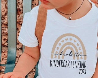 T-shirt of babyrompertje I "Kitakind 2024" / "Kindergartenkind 2024" I gepersonaliseerd met naam I Kita Start I cadeau